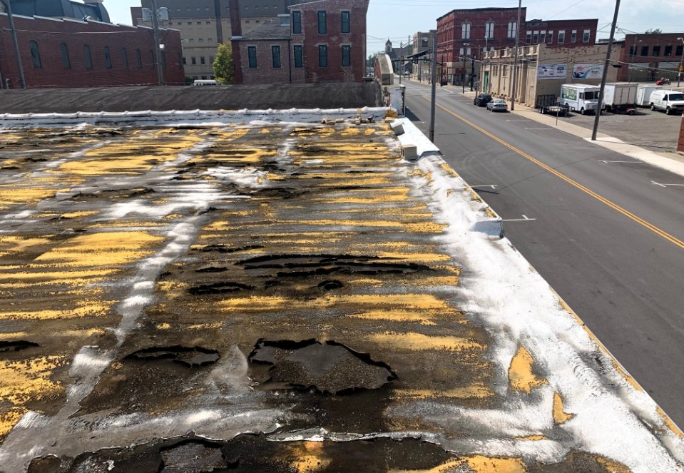 Roof with missing shingle | Technical Roofing | Service Maintenance
